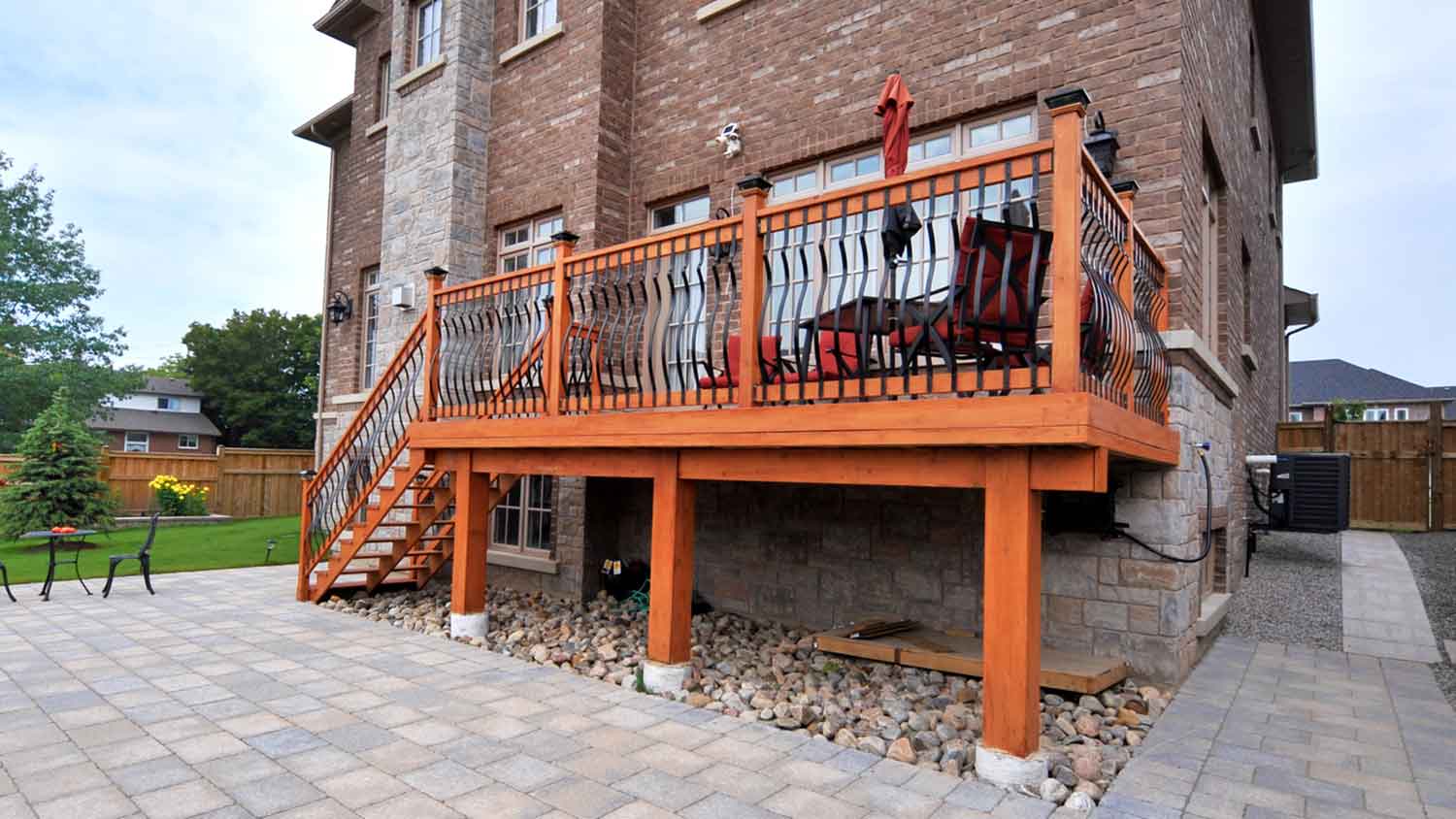 Backyard with wooden raised deck