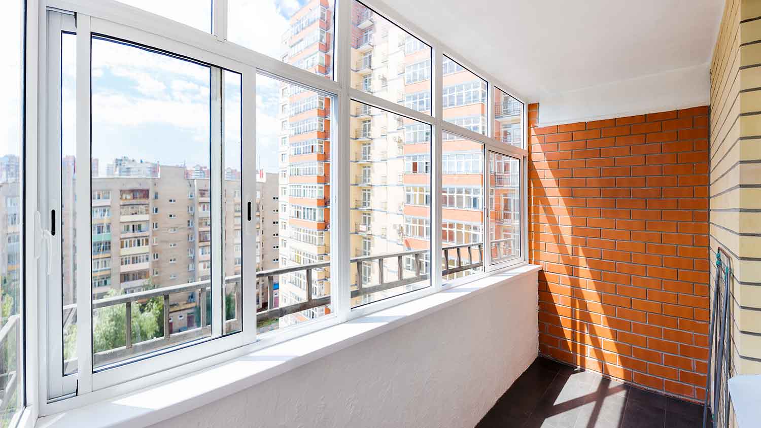 apartment balcony with sliding windows