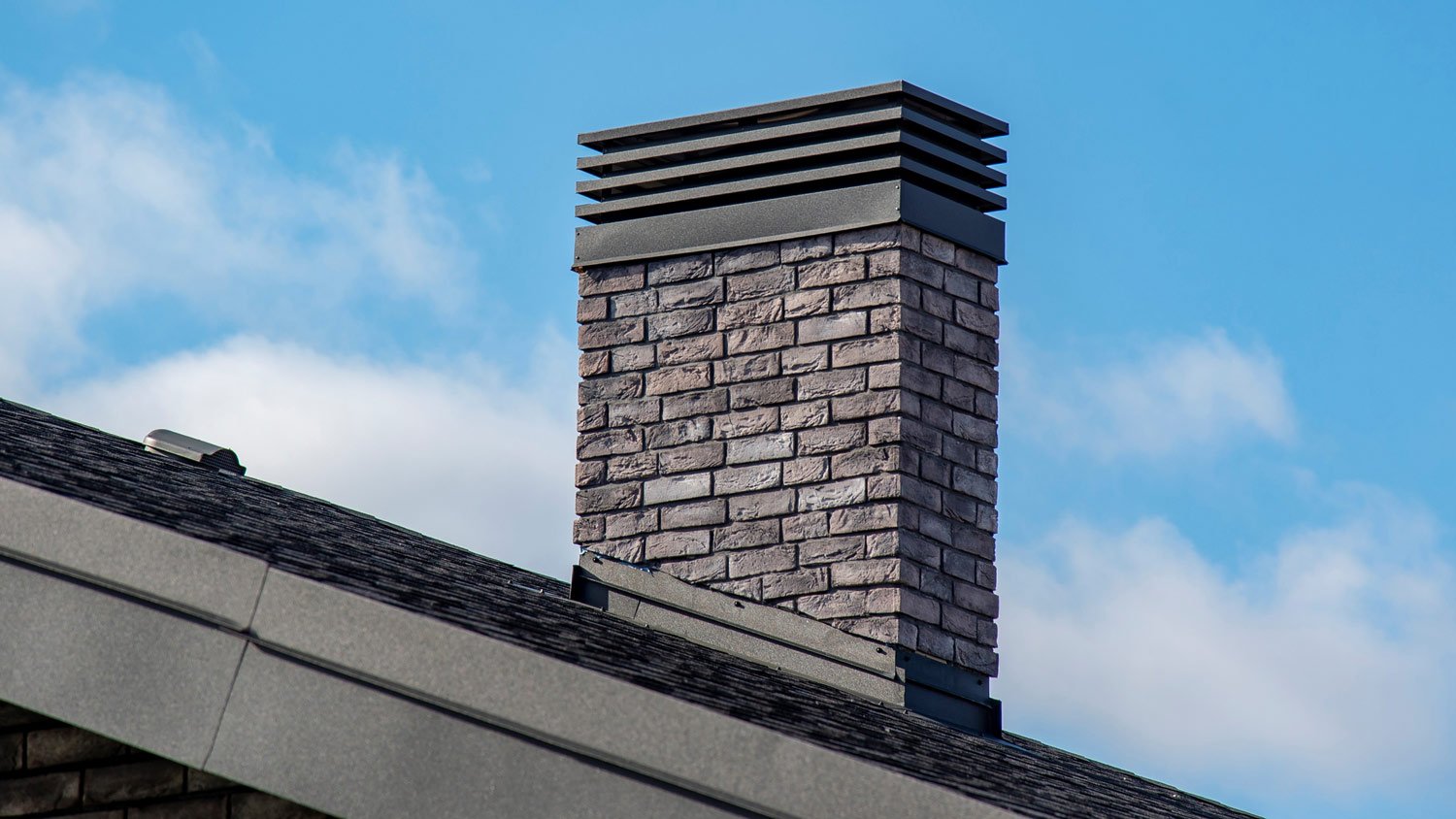 Modern metal chimney cap for ventilation