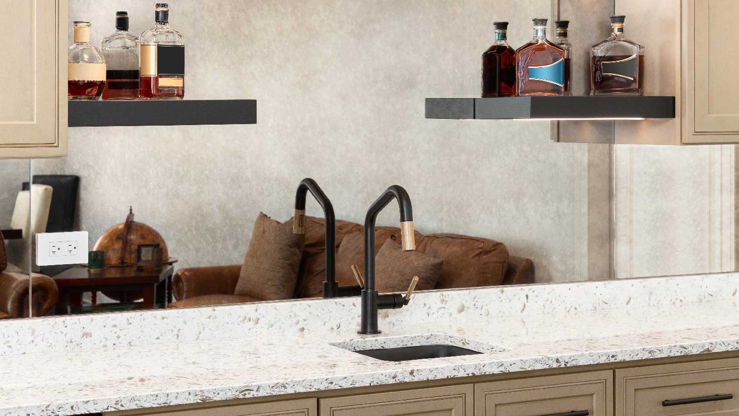 A bar sink and floating shelves