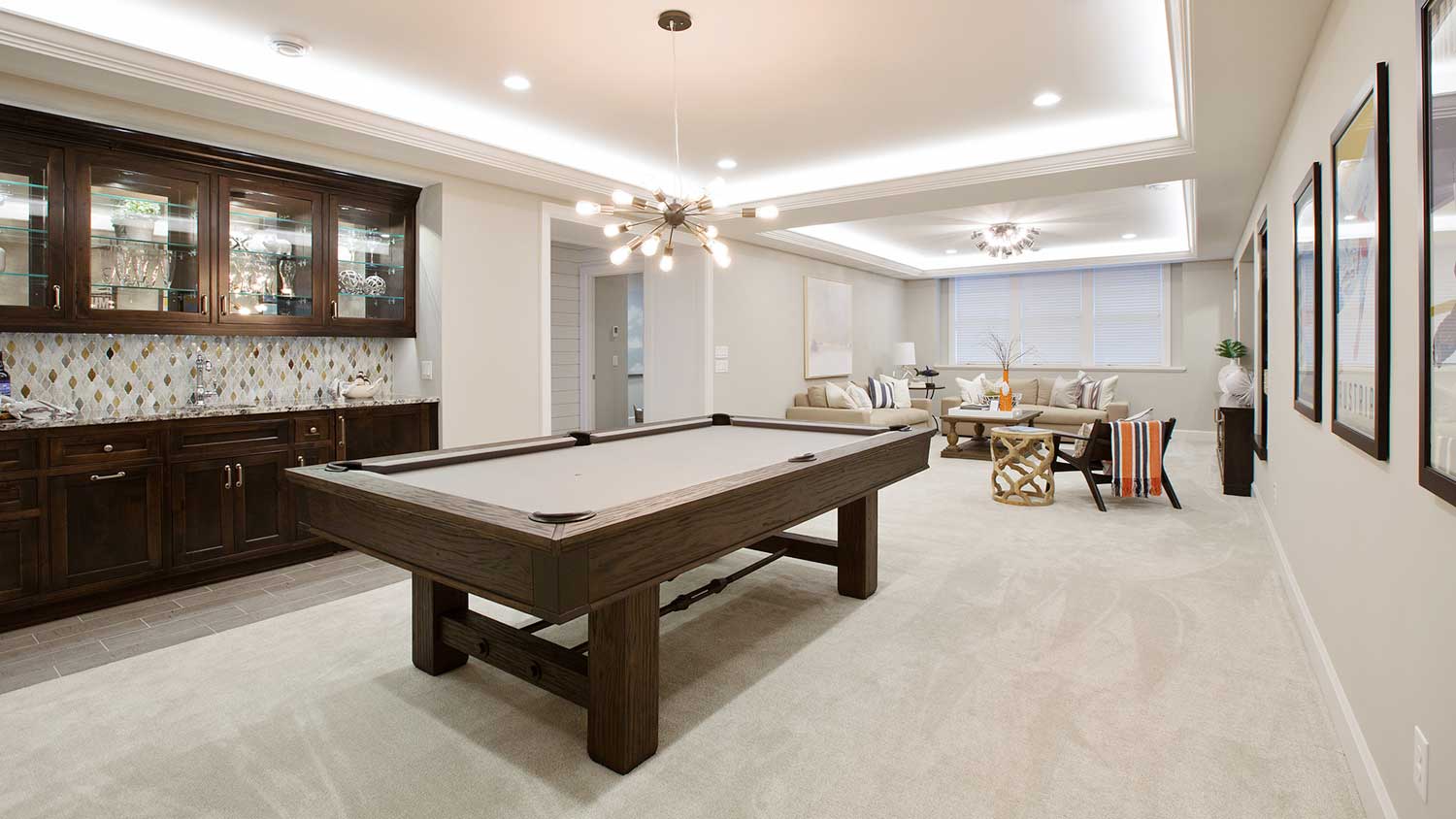 Finished basement with kitchen and pool table