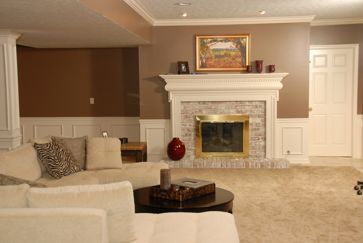 basement living room with fireplace