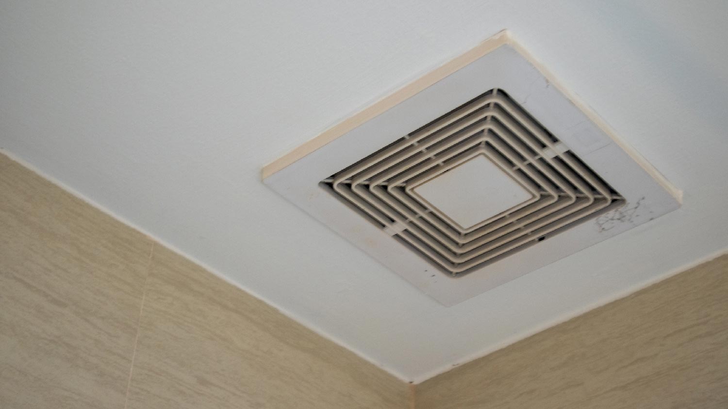 A bathroom exhaust ceiling fan