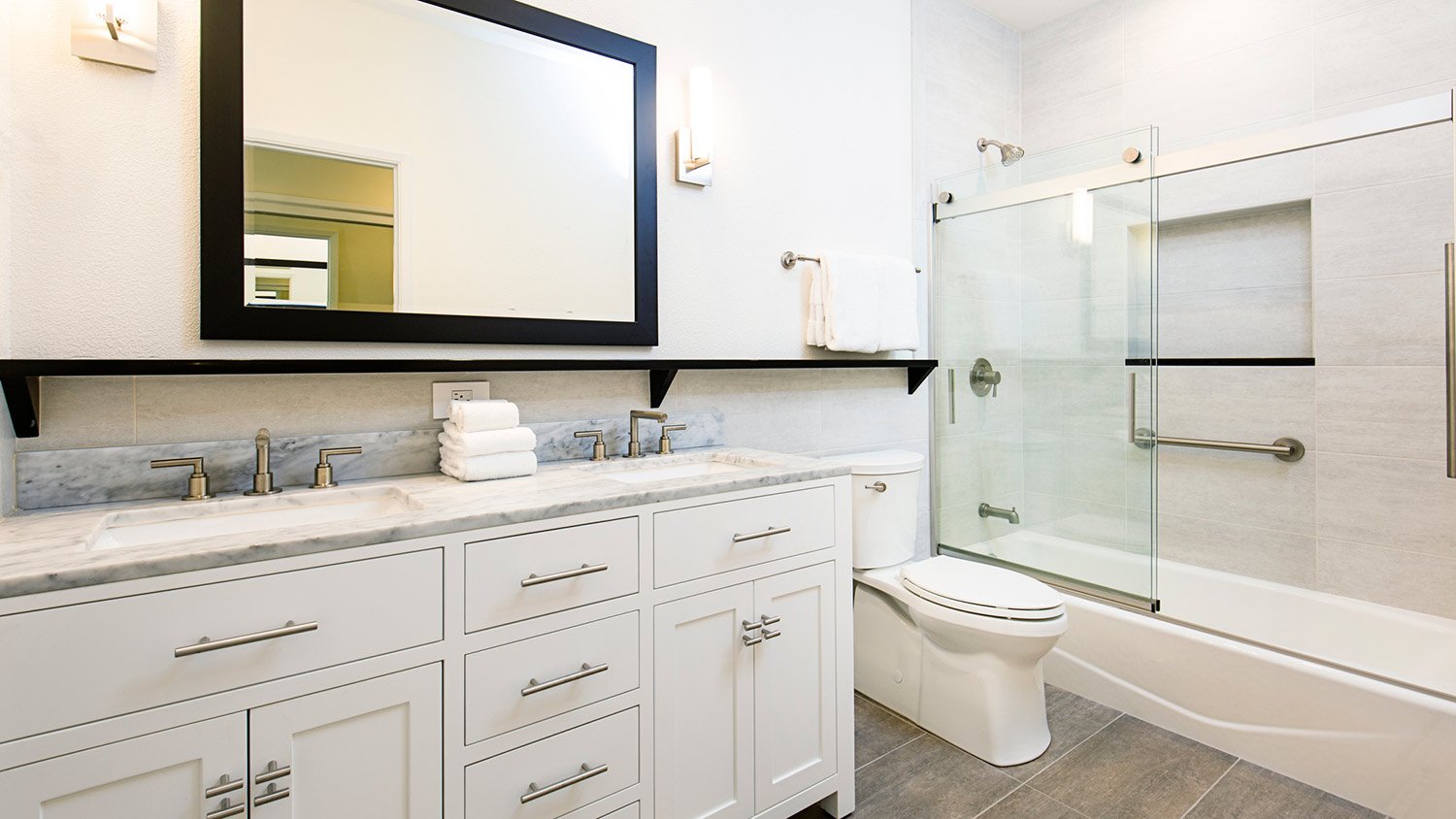 Contemporary bathroom with vanity and toilet