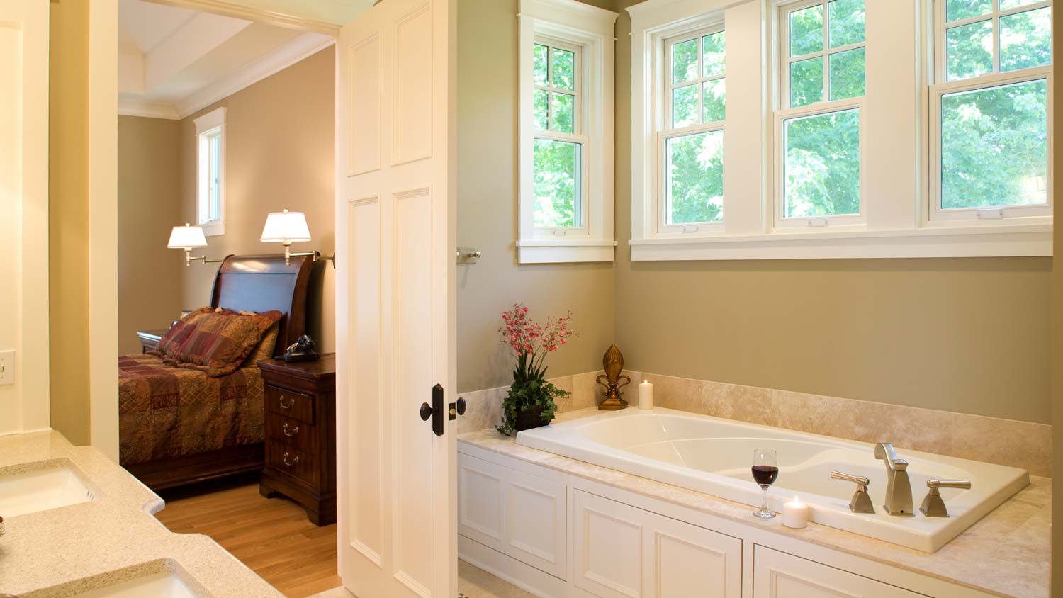 A bathtub in an en-suite bathroom