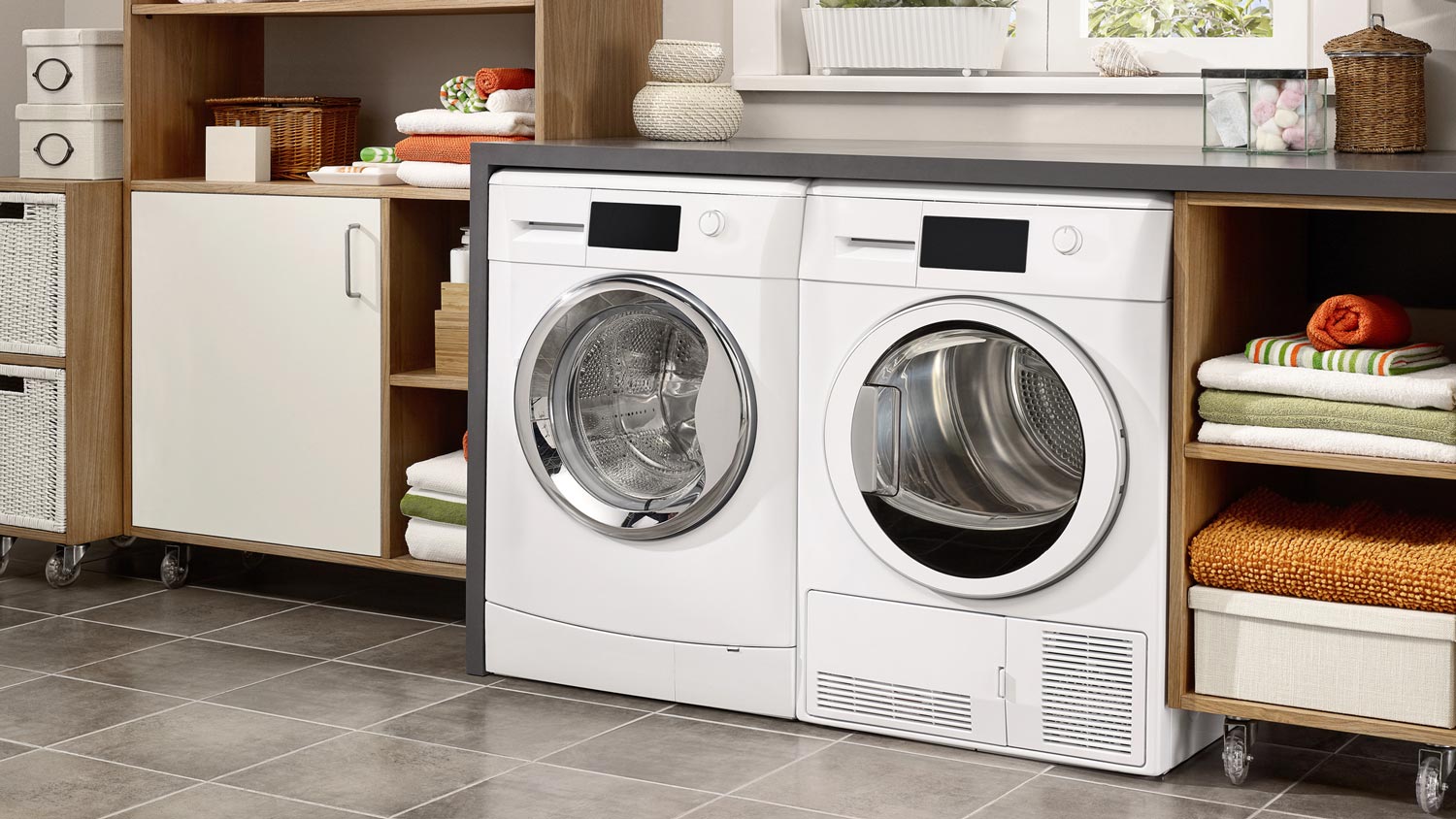 A beautiful laundry room with tiled flooring
