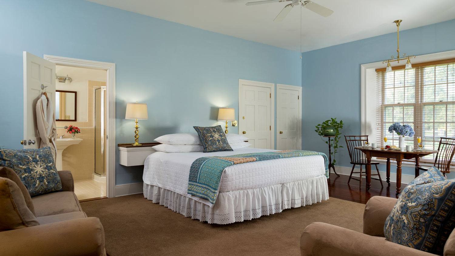 A bedroom with blue walls