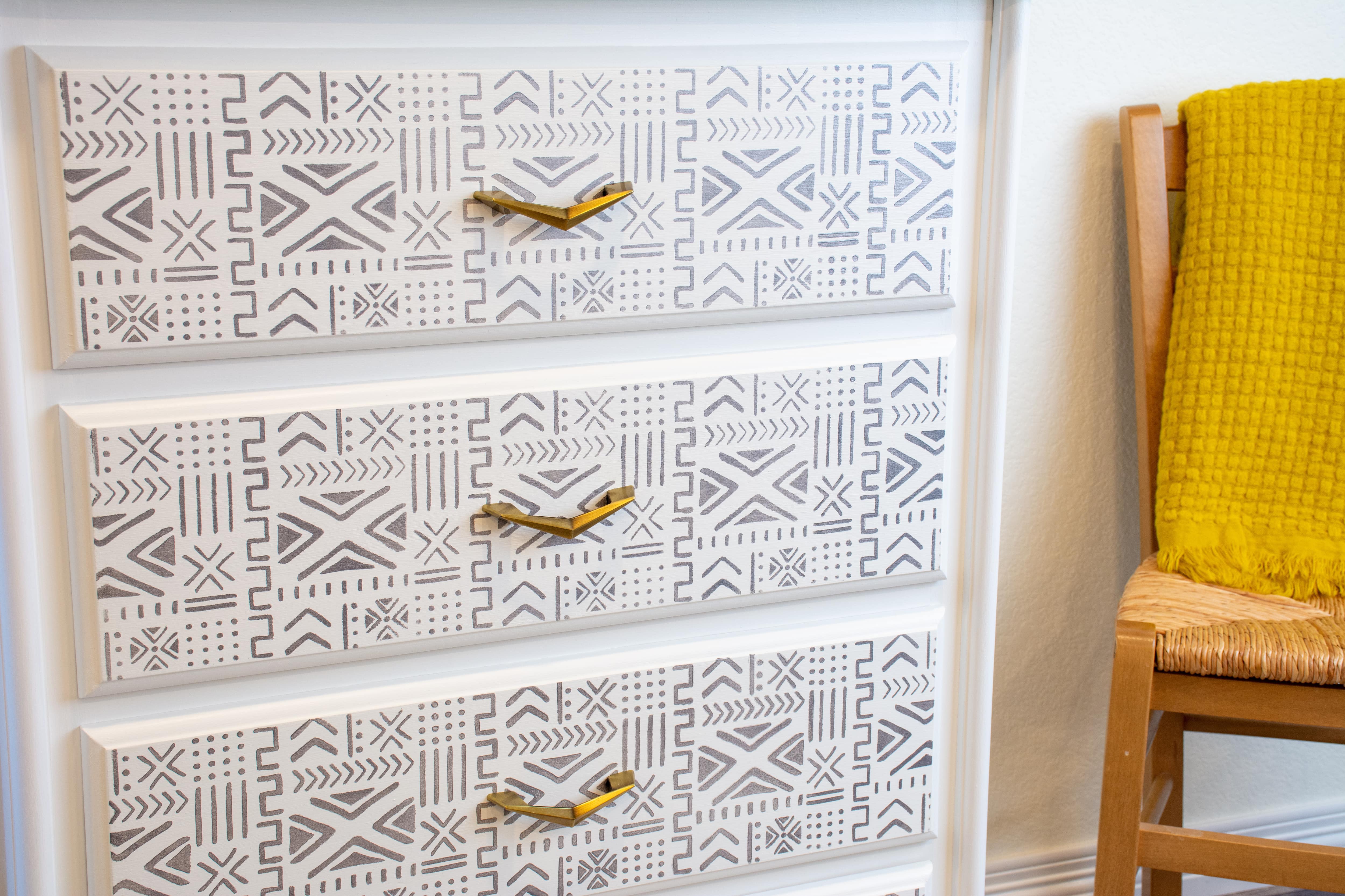 Patterned dresser with mid-century modern gold drawer pulls