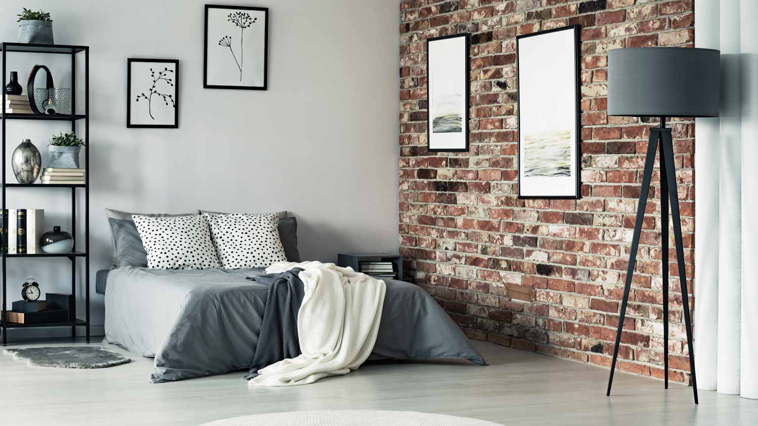 A bedroom with a german schmear on an accent wall