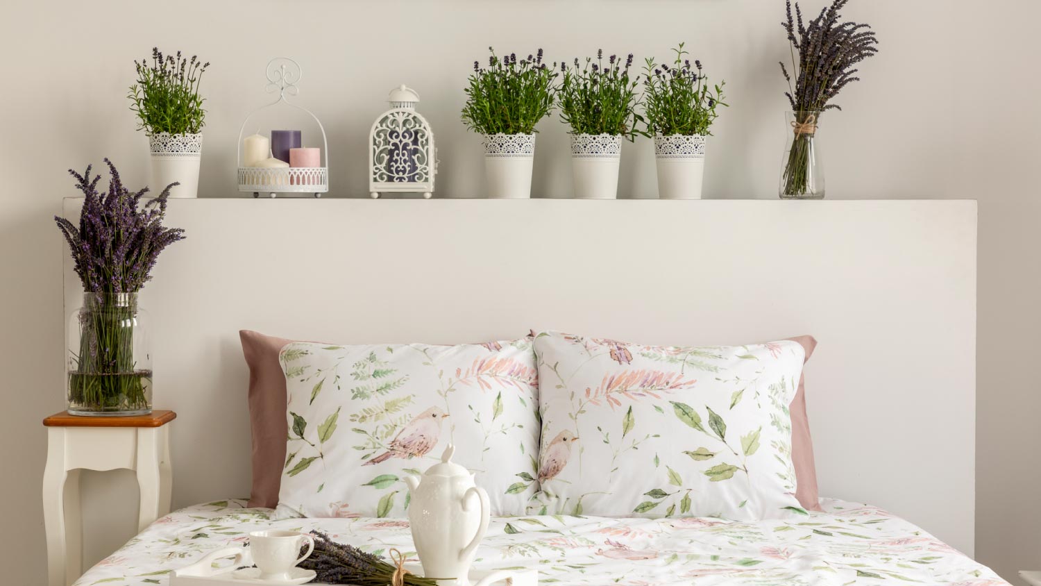 A bedroom with lavender decoration