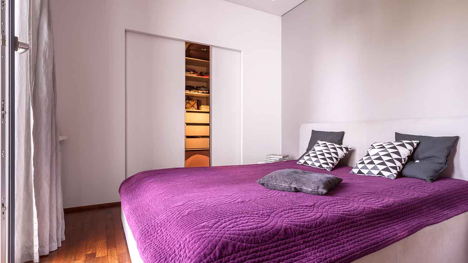 Pocket doors installed in the closet of the bedroom