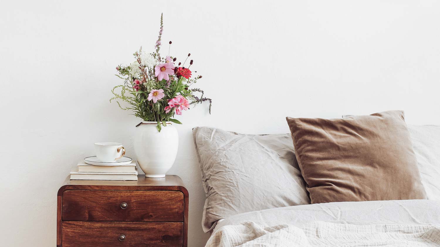 bedside table with fresh flowers