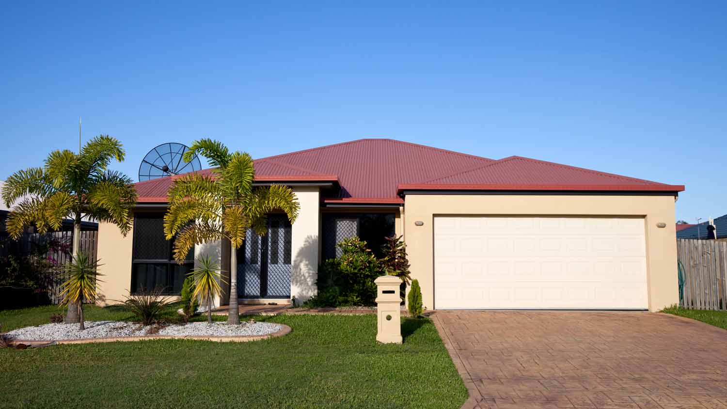 tropical beige house with red roof