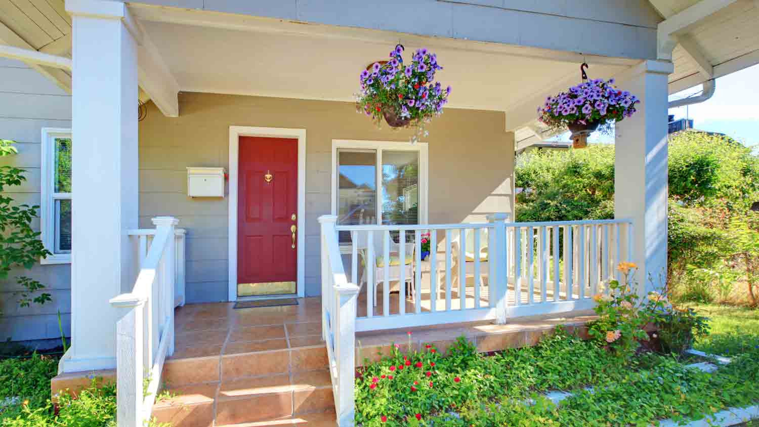 beige house with red door