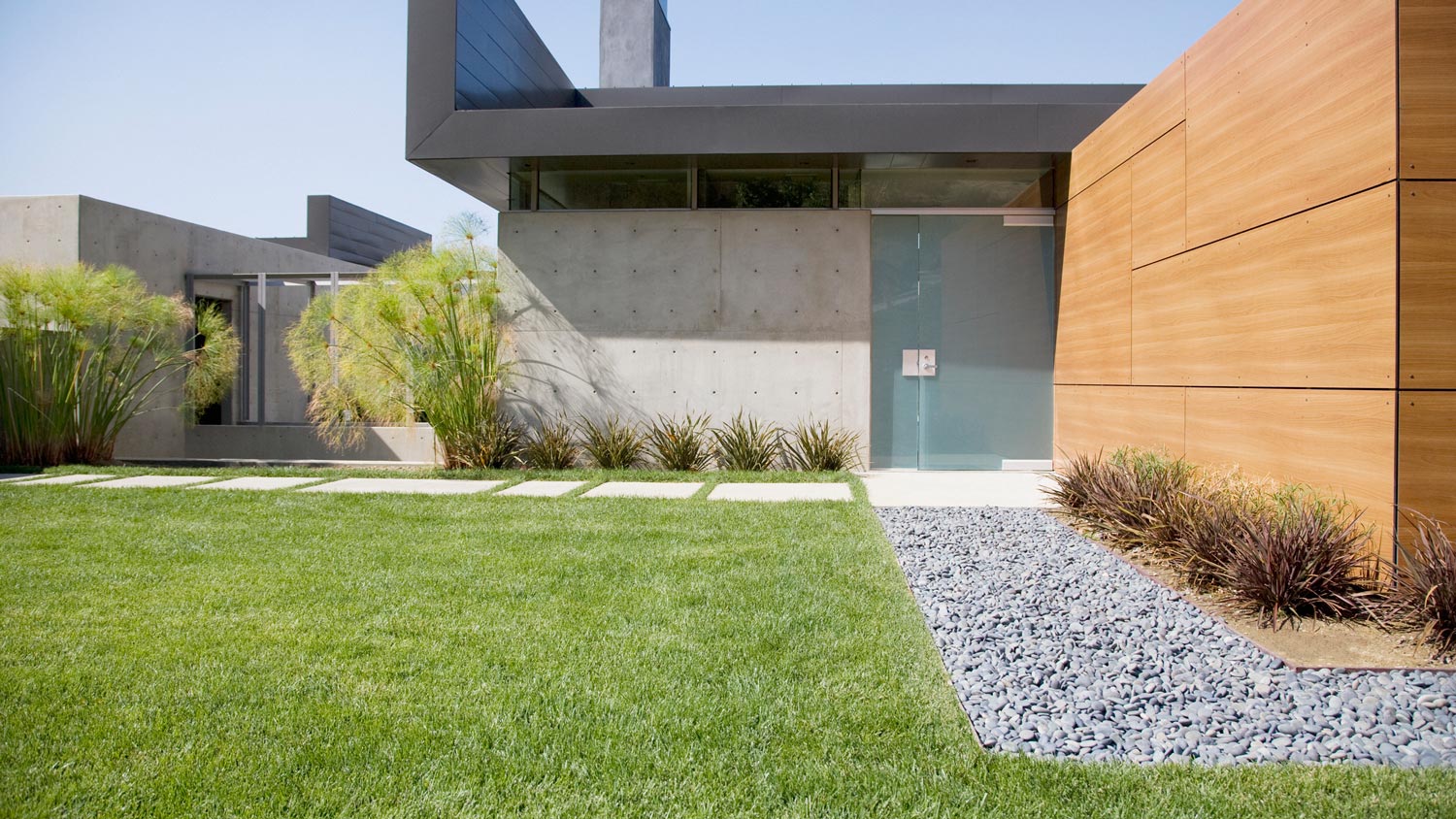 Bermuda grass in front of a modern house