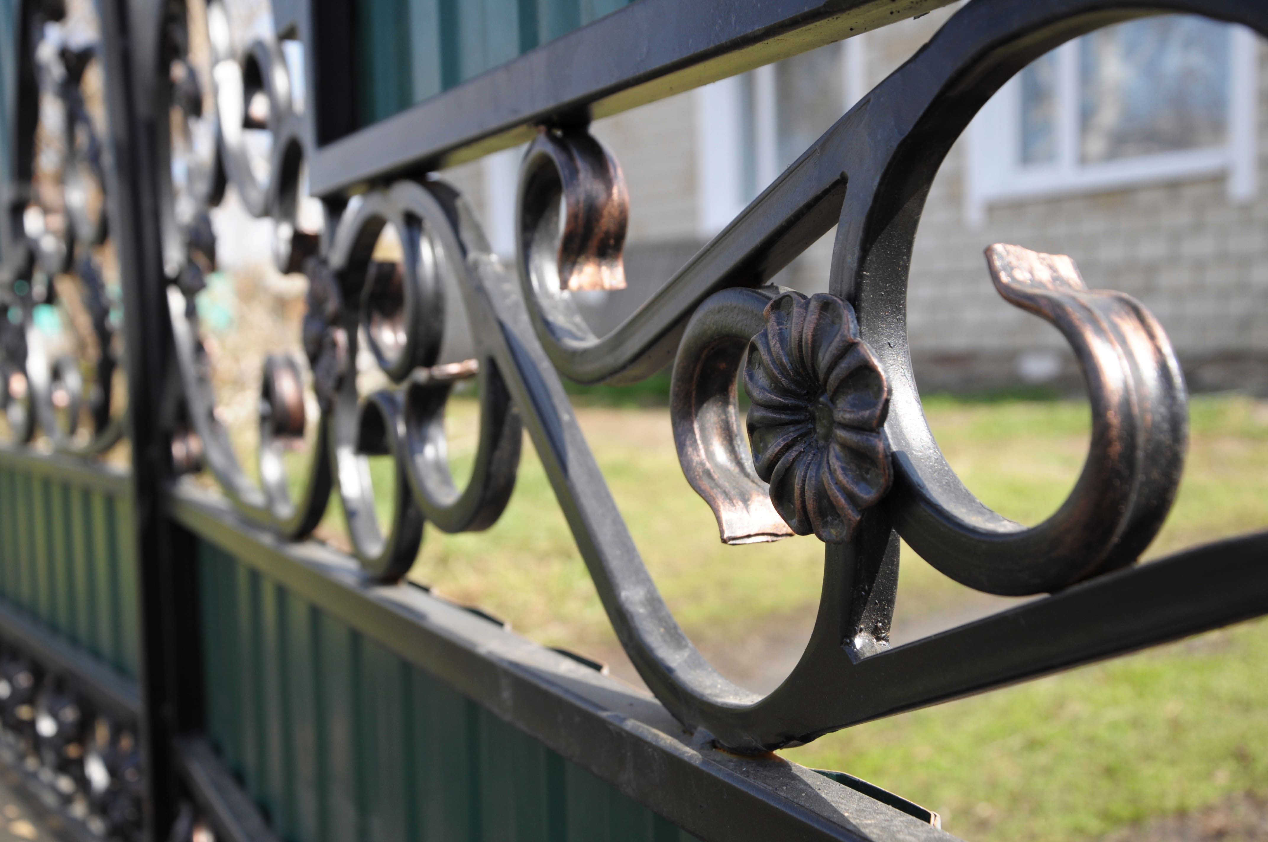 Ornamental metal fence in yard