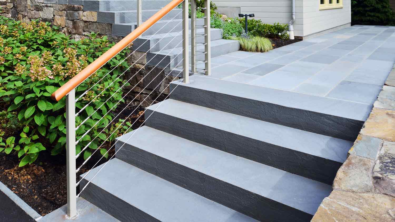 Blue stone steps leading to home