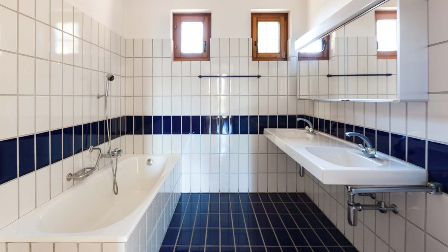 A blue and white tiled bathroom