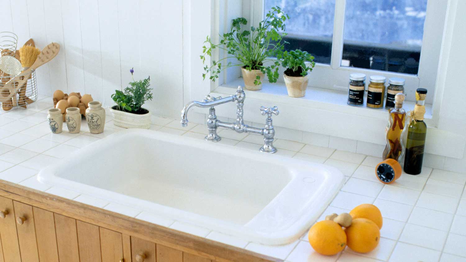 Bridge faucet installed in a country style kitchen