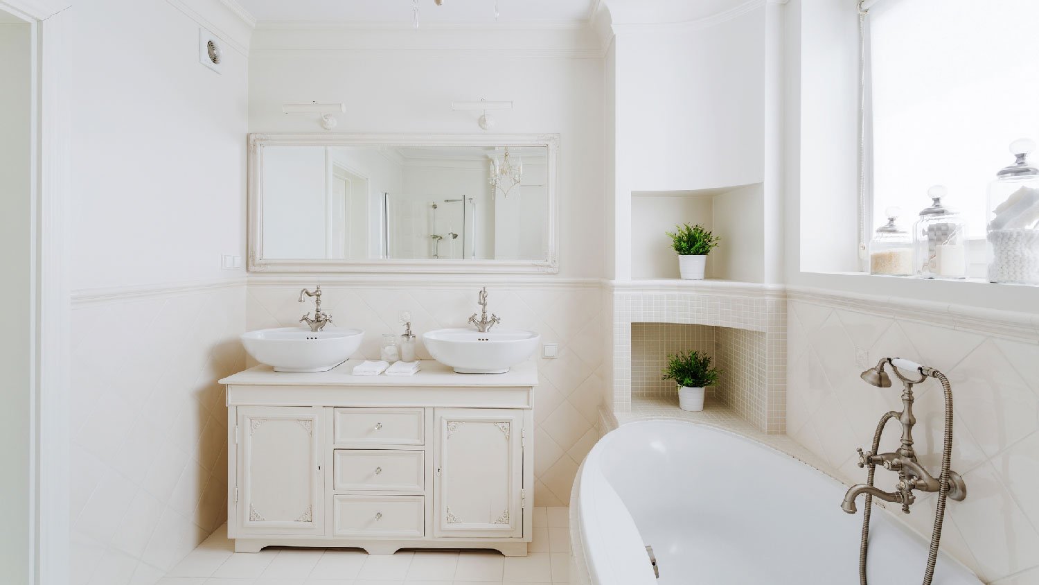 A bright bathroom with drywalls