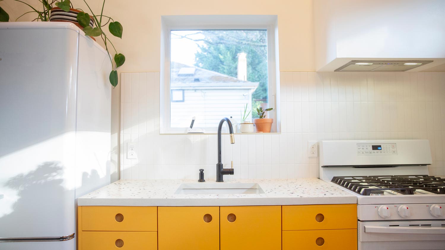 A bright kitchen with terrazzo countertop