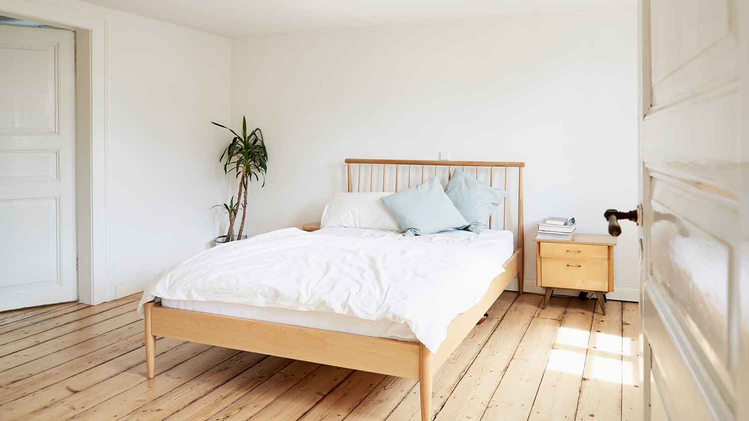 Hardwood flooring installed in a bright bedroom 