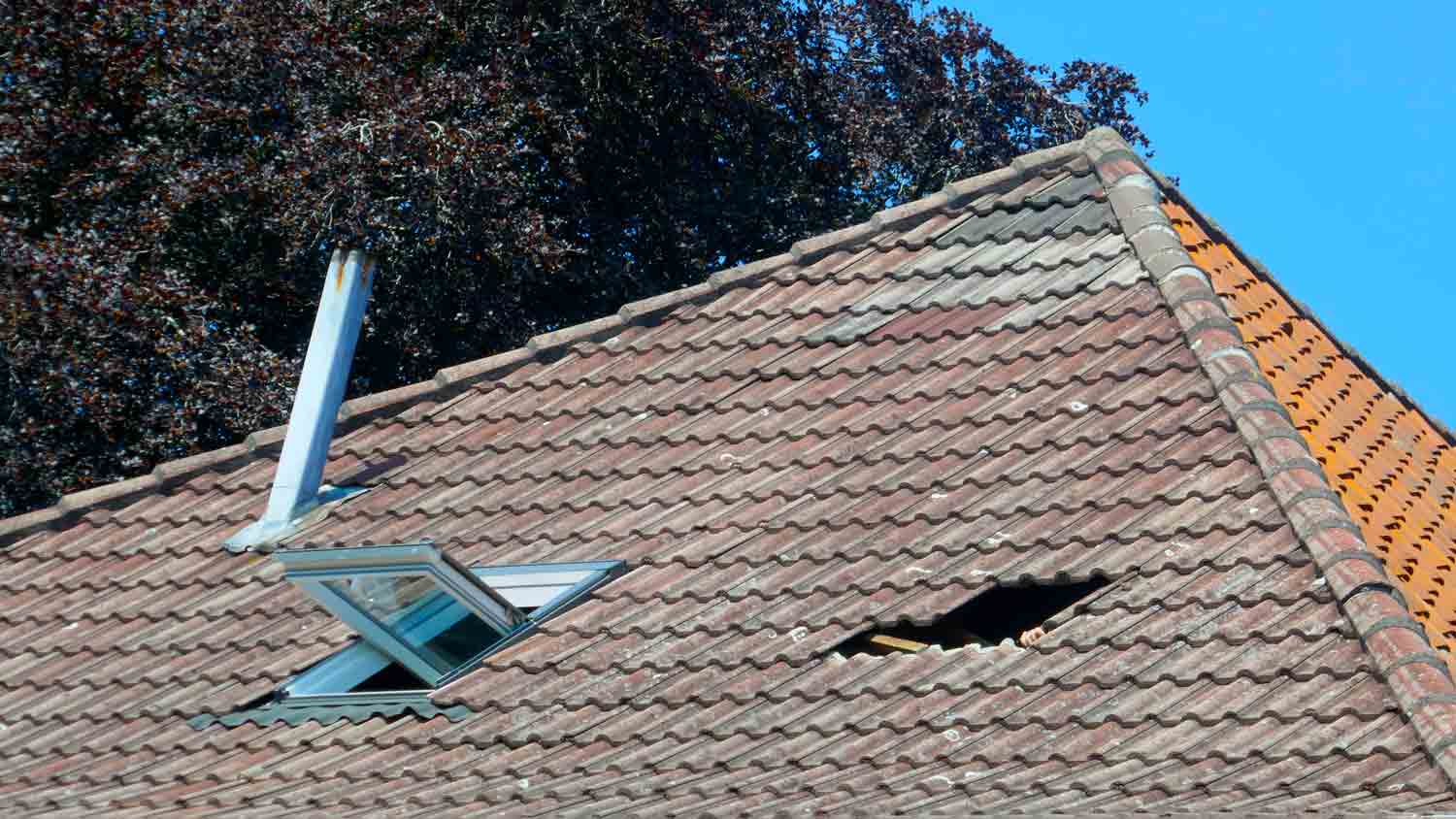 broken tile roof damage