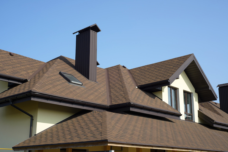 brown tiled roof of two-story house