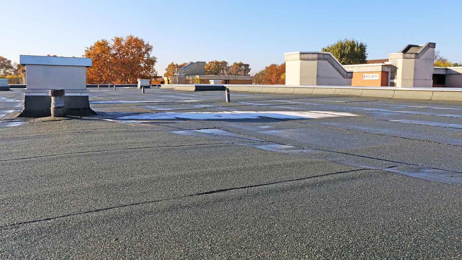 Waterproofing material installed on a flat roof