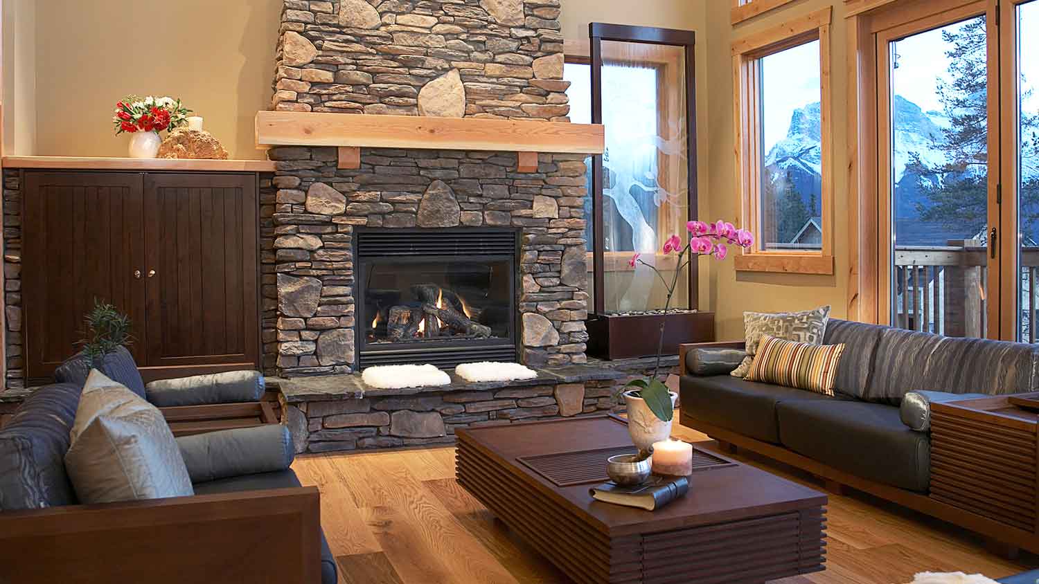 Stacked stone fireplace with a large hearth