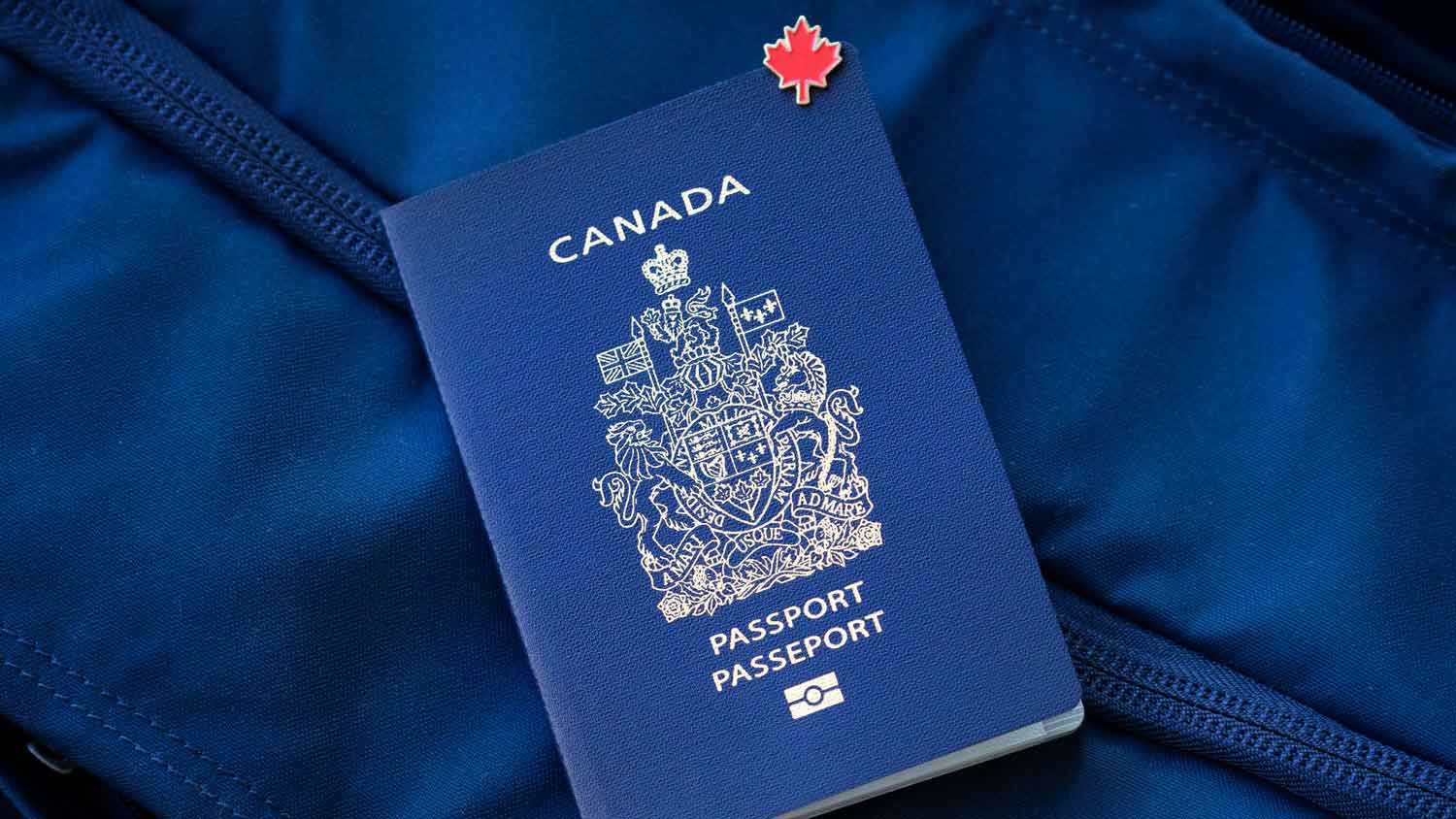 canadian passport on duffle bag