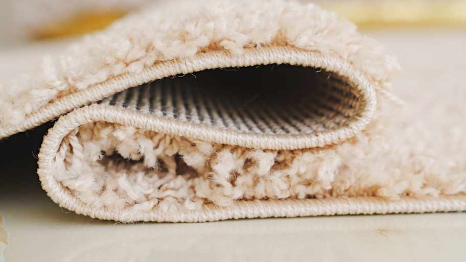Close-up. beige Interior pile carpet made of polypropylene