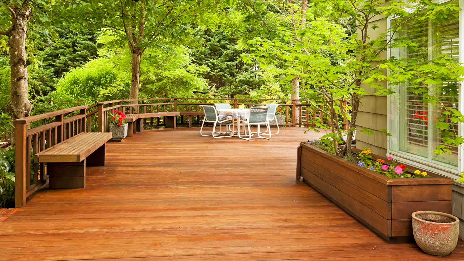 Large cedar wood deck in the backyard