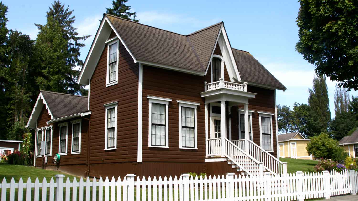 Country house exterior painted chocolate brown