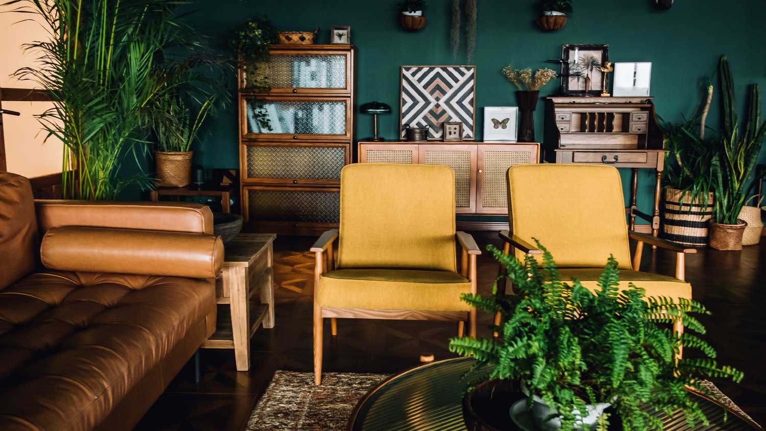 Stylish living room interior with brown and yellow colored furniture
