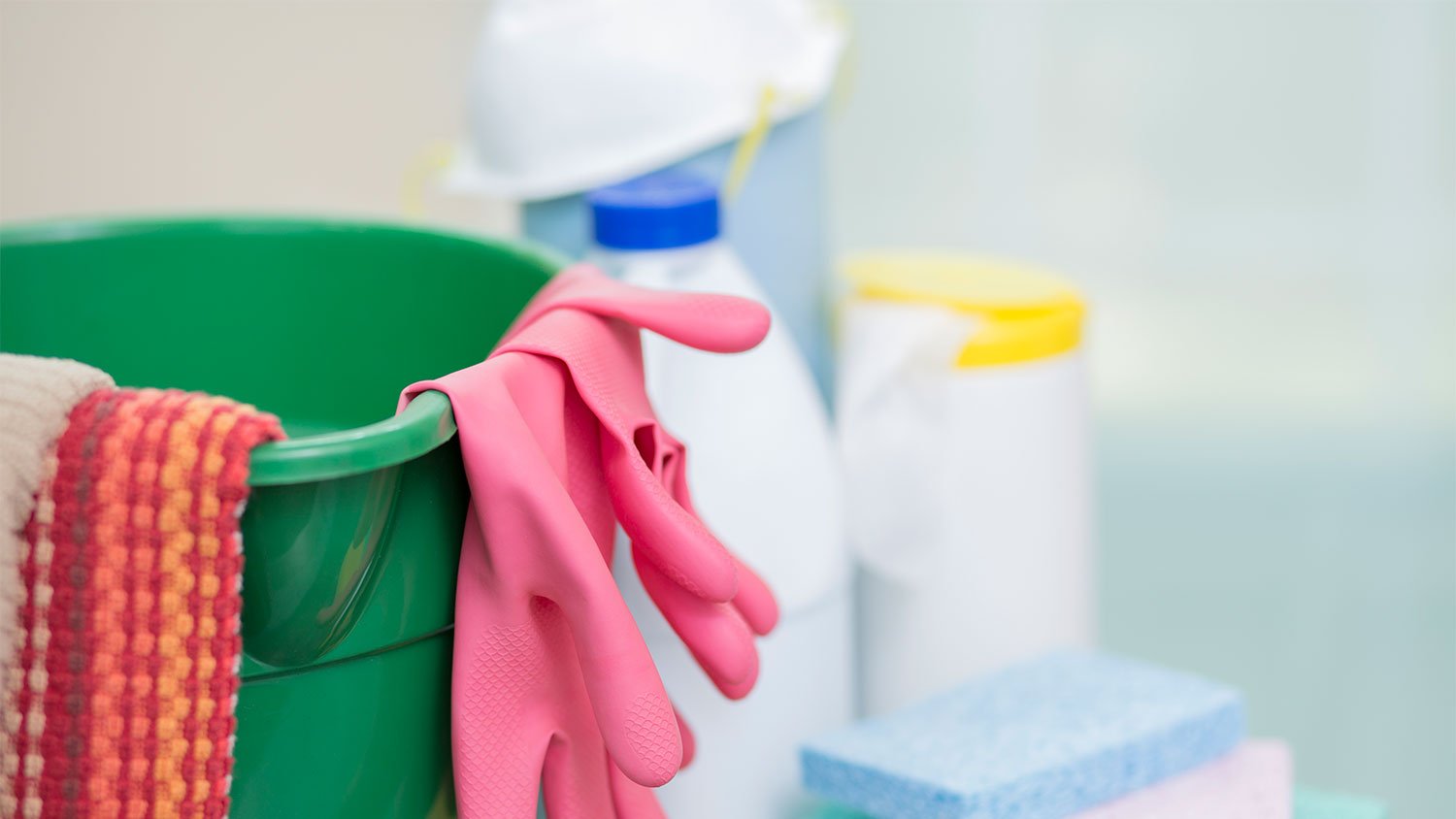 A view of cleaning products in a bucket