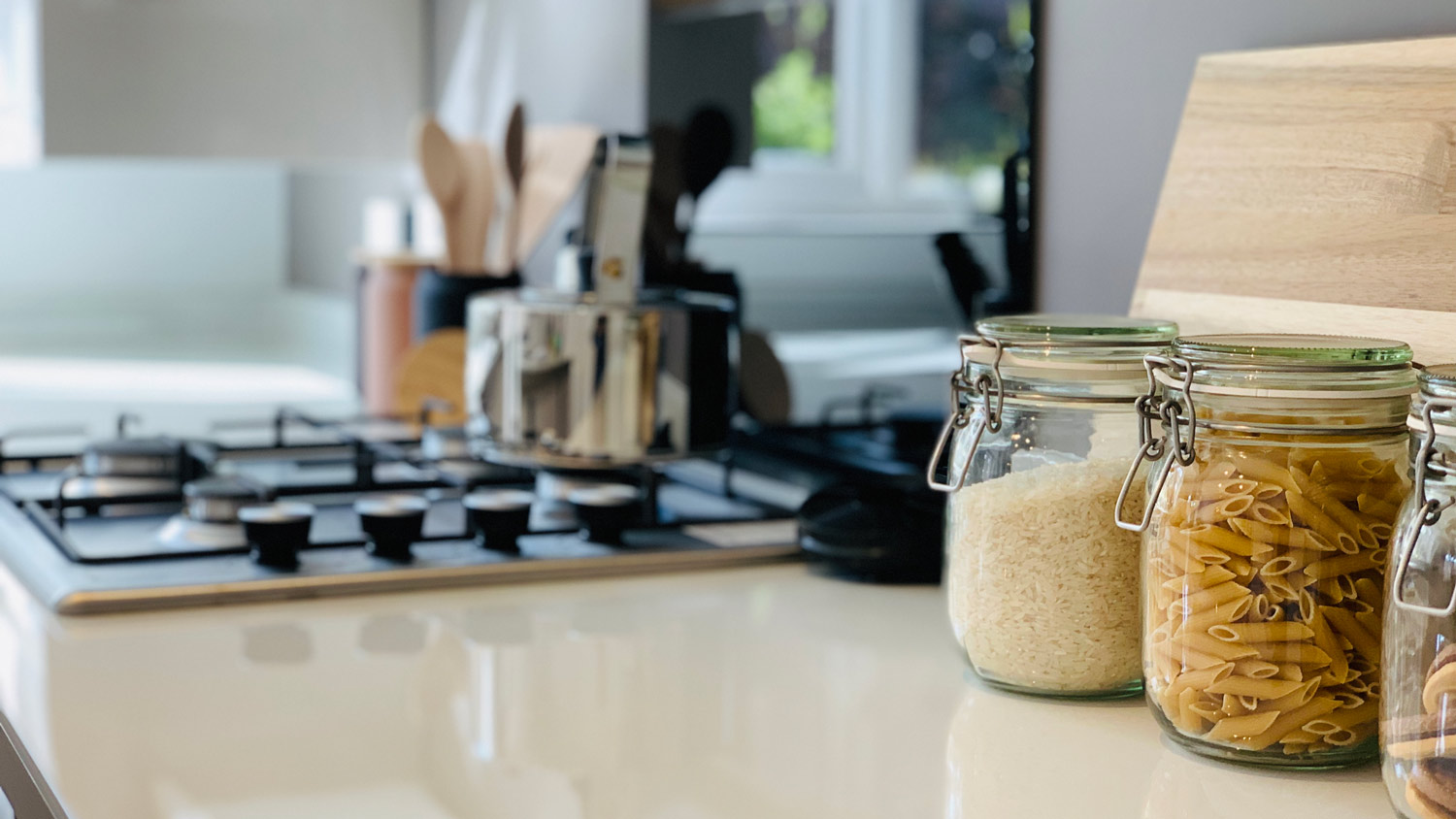 Clear jars on kitchen counters