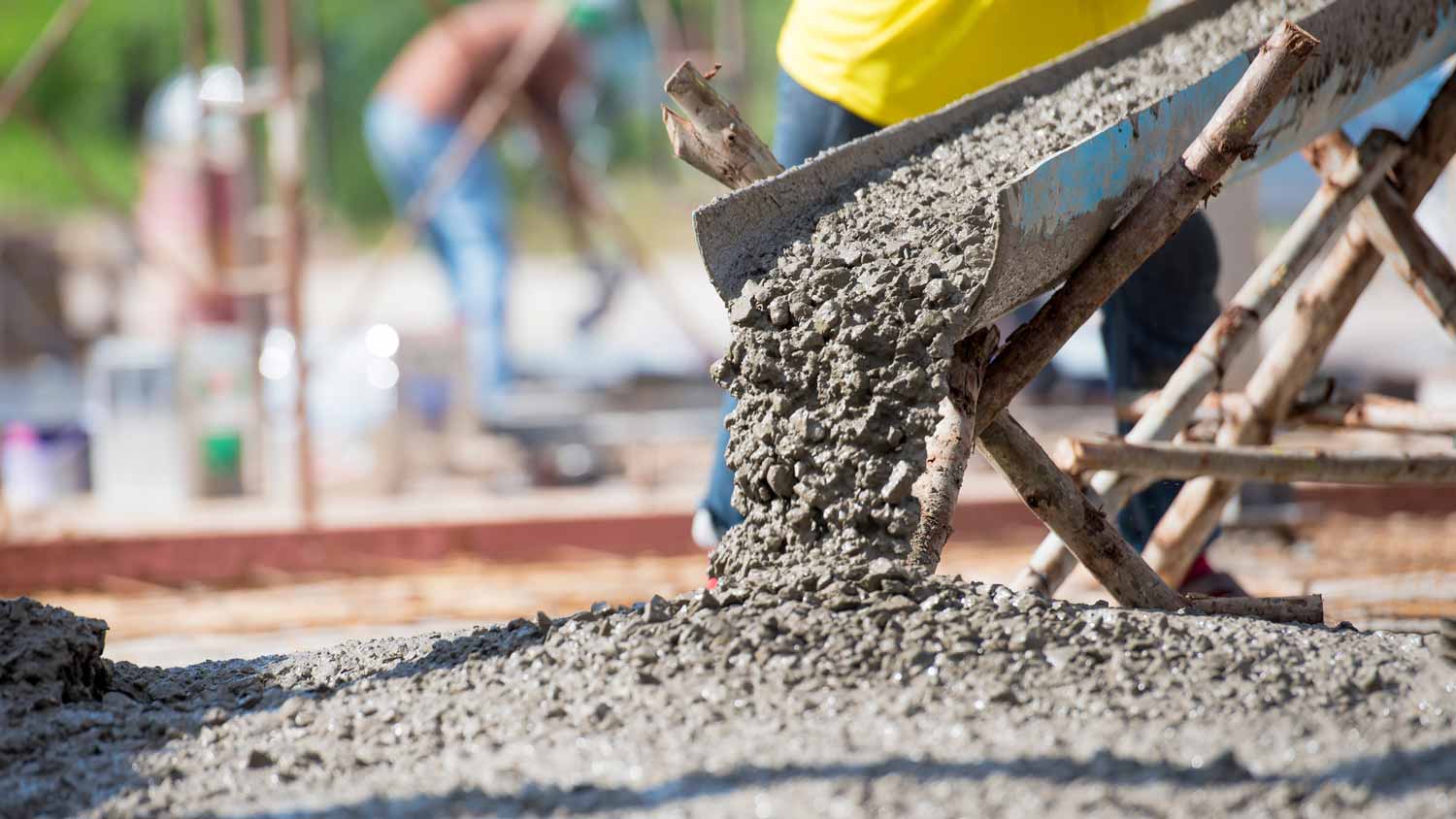 Close-up of concrete being poured