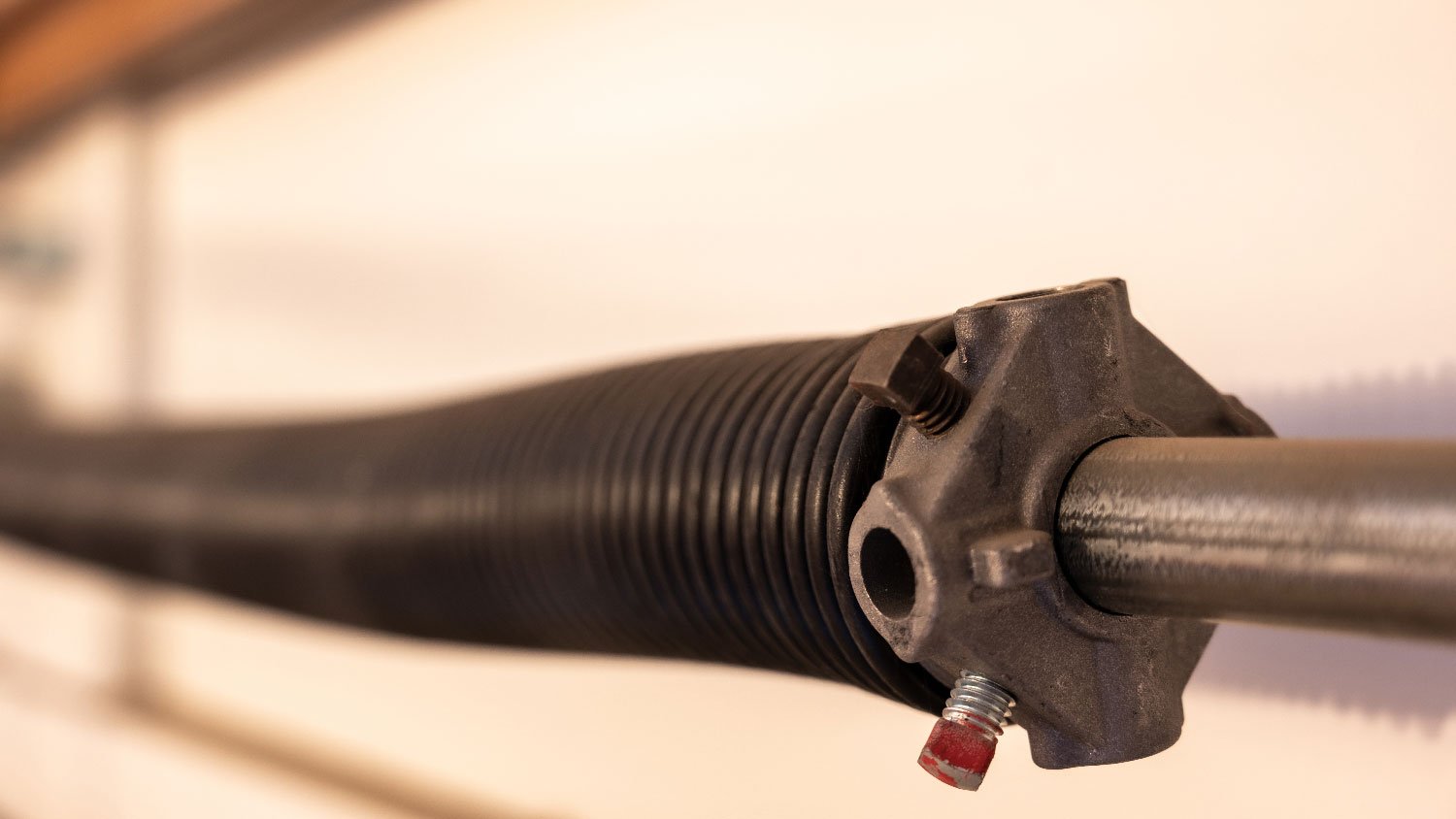 Close-up of a garage torsion spring