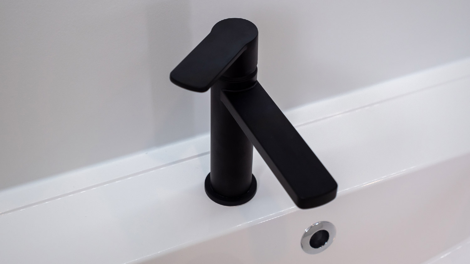 Close-up of a matte black faucet