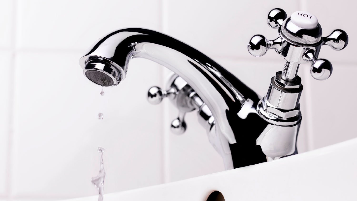 Close-up of a polished chrome faucet