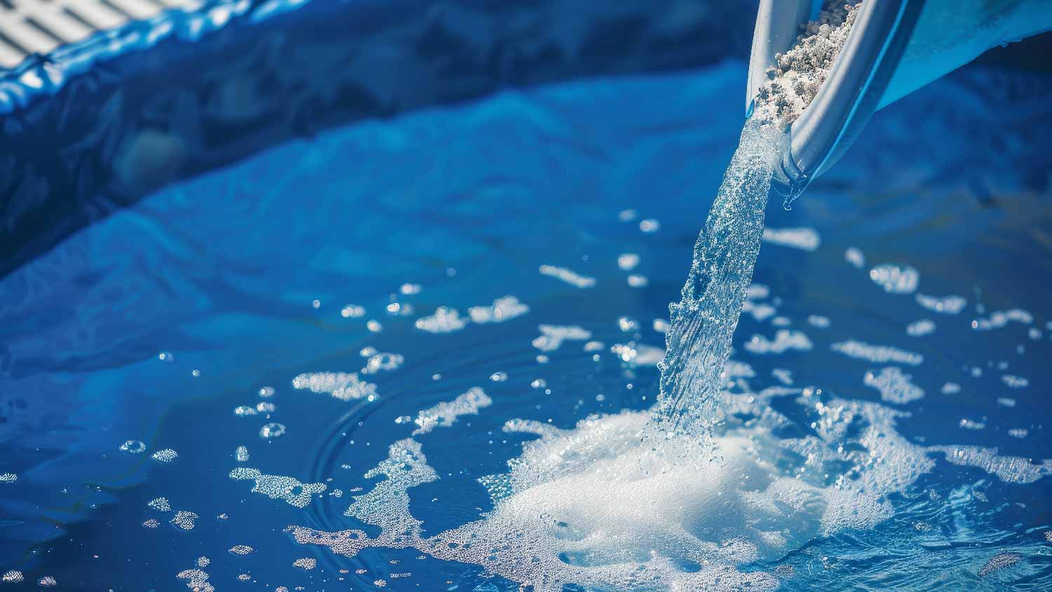 Close-up of a person performing a pool shock