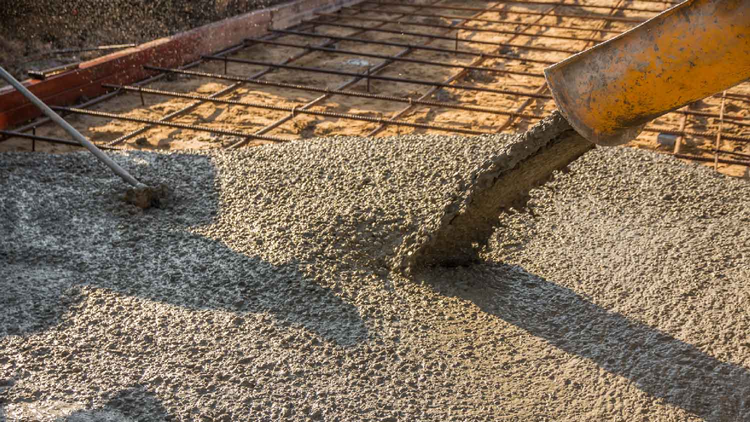 Close-up of ready-mixed concrete being poured