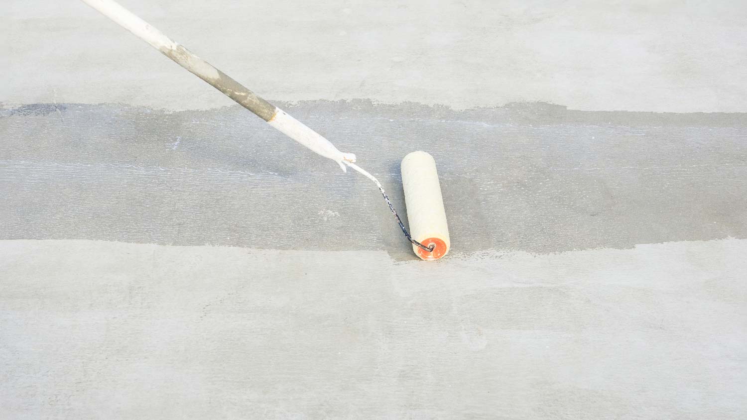 Close-up of repairing a concrete patio