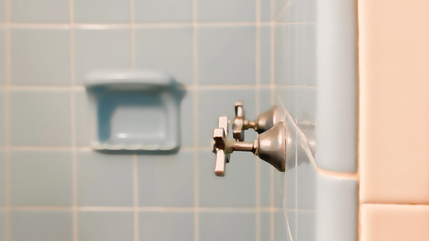 Close-up of silver shower fixtures