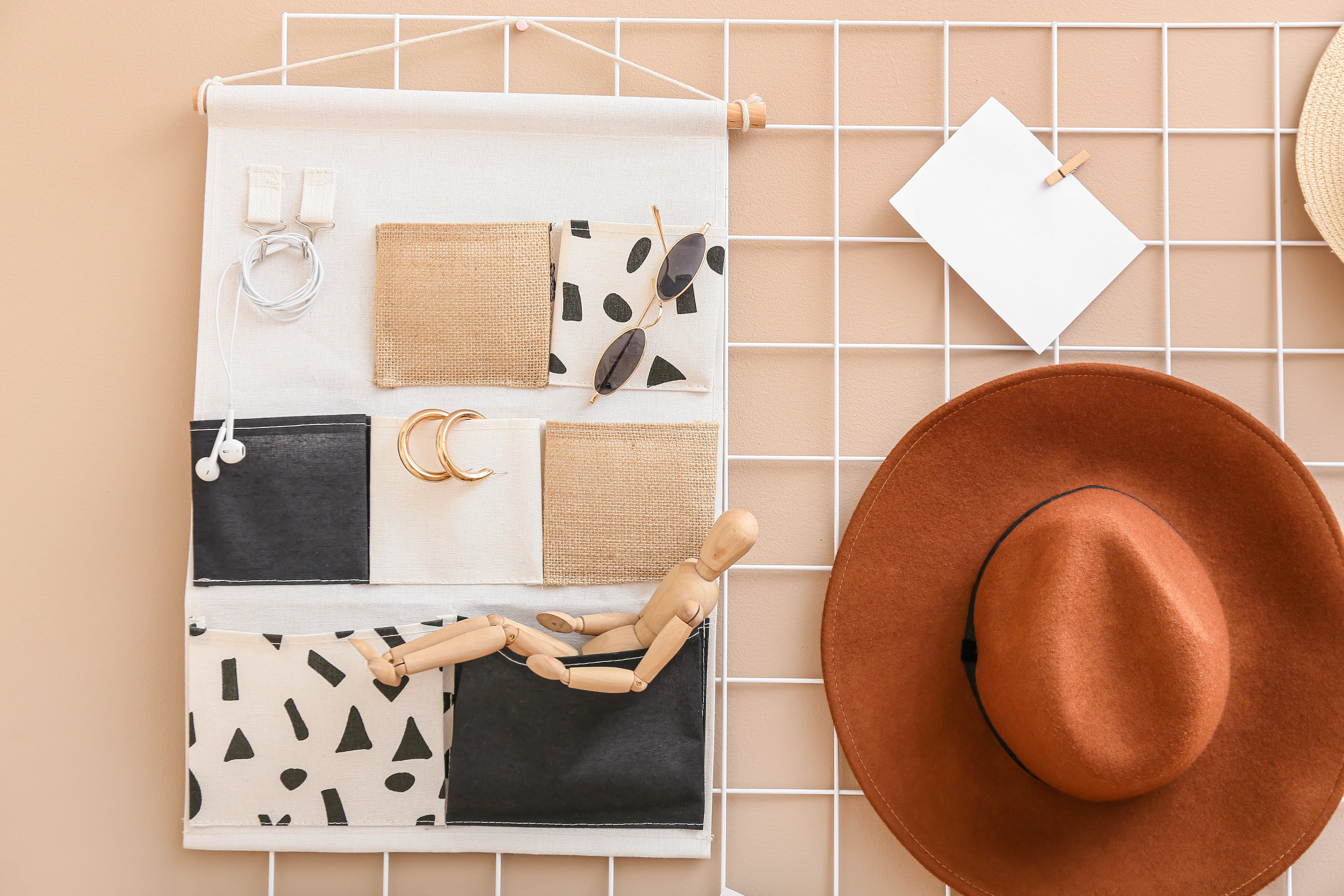 A DIY wall jewelry organizer with grid wire backing
