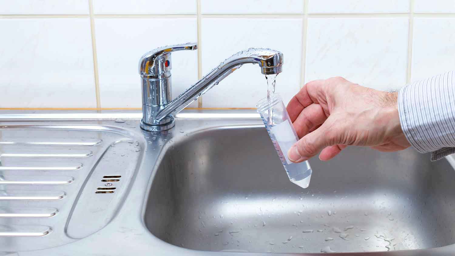 Filling test tube with well water