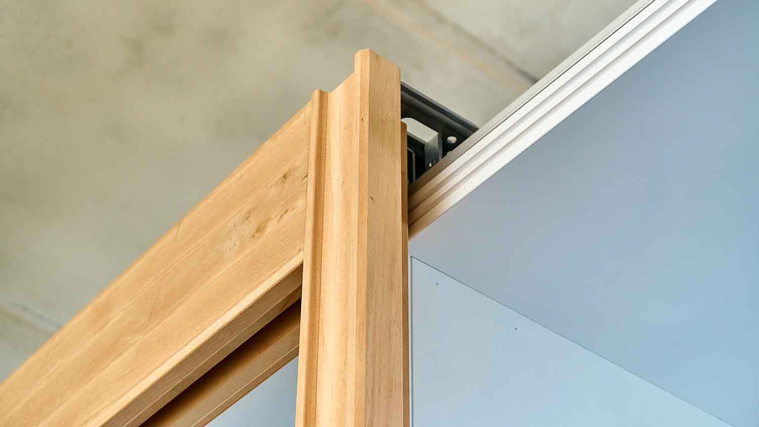 Closeup of a sliding door concealed track