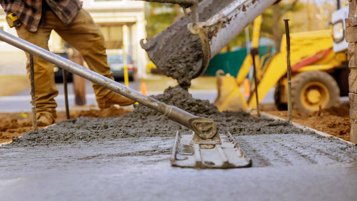 Close-up of concrete pouring on a construction site