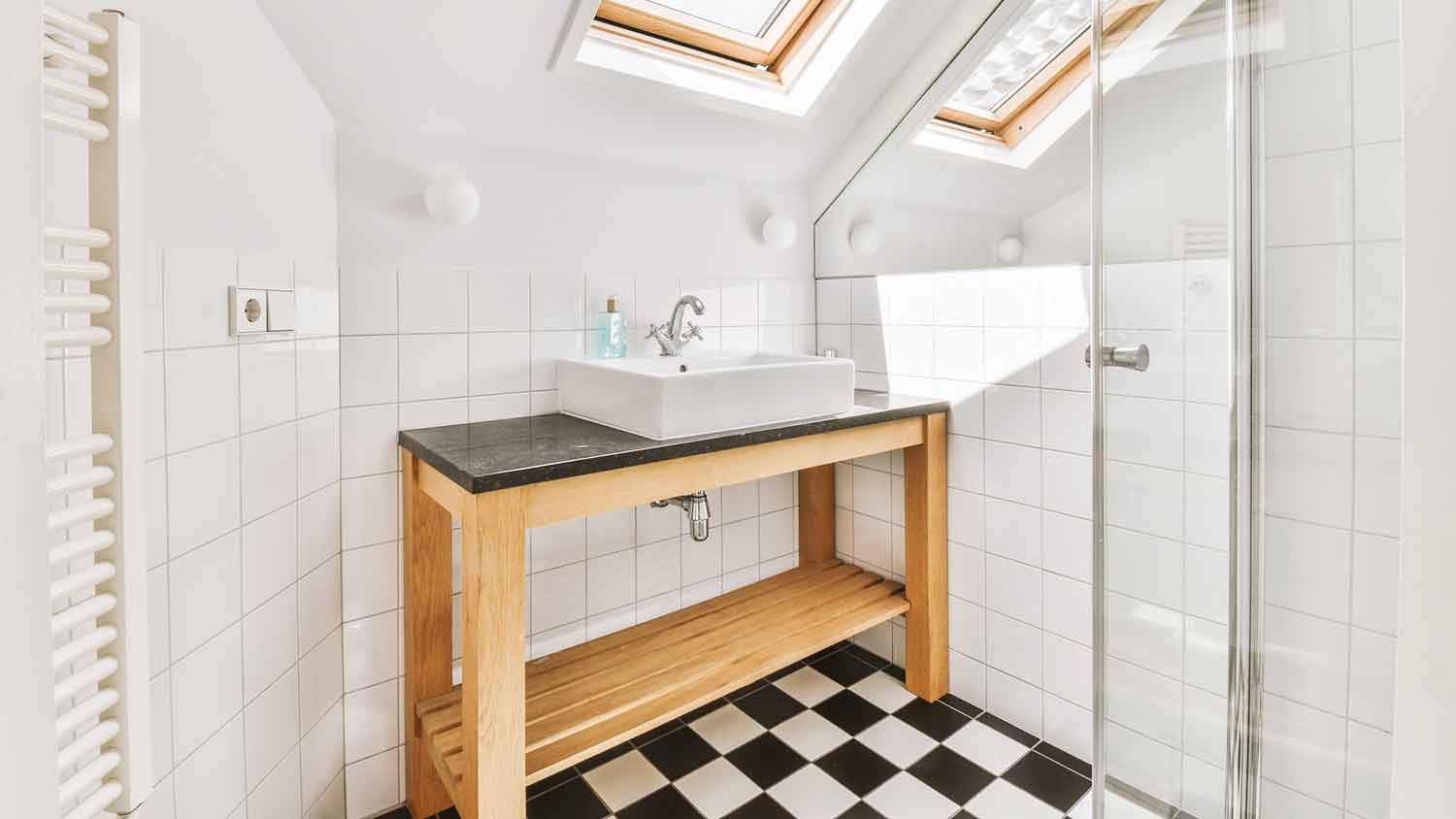 Bright white bathroom with console vanity